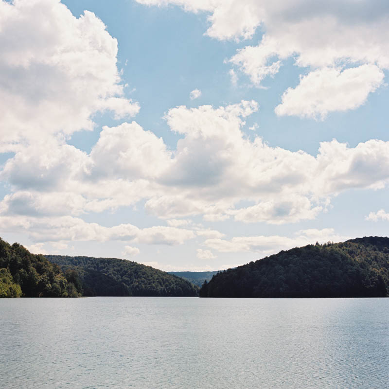 Blue skies and quiet waters in Plitvice Lakes, Croatia Lika Banshoya